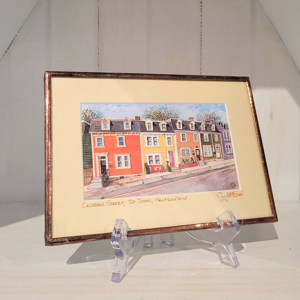Copper framed art reproduction by Cynthia Noel titled "Cochrane Street, St. John's, Newfoundland".