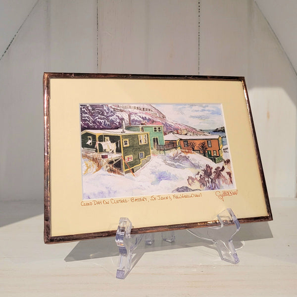 Copper framed art reproduction by Cynthia Noel titled "Good Day on Clothes - Battery, St. John's, Newfoundland".