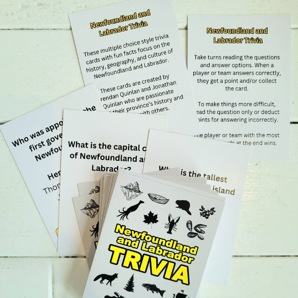 Trivia cards on Newfoundland and Labrador with question and answer options displayed in a pile on a white background