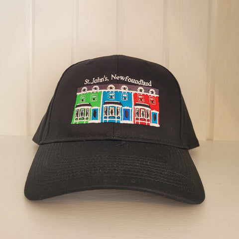 black baseball cap with green, blue, and red stitched rowhouses