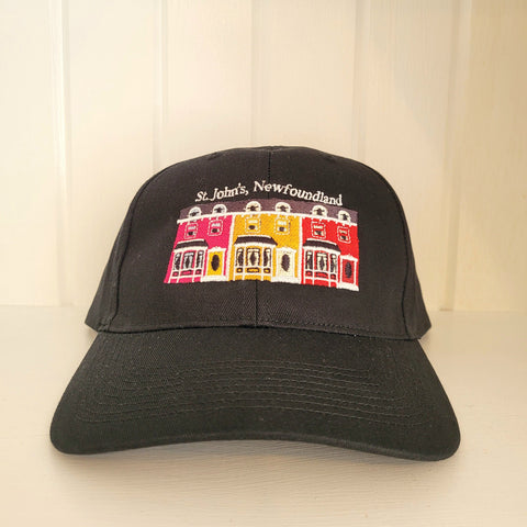 black baseball cap with stitched pink, yellow, and red rowhouses