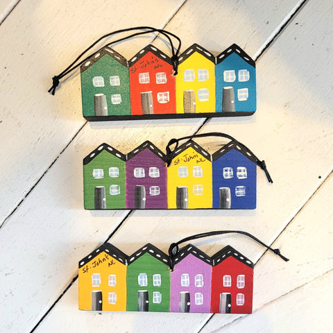 three hand-painted rowhouse ornaments with "St. John's, NL" on the front