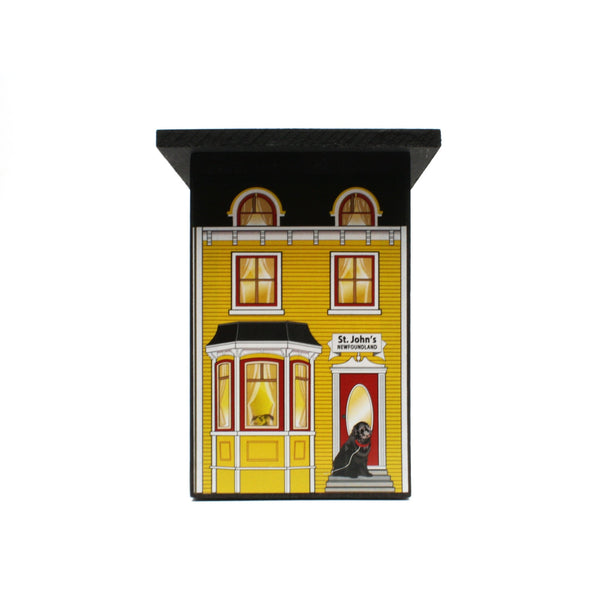 yellow St. John's house with white trim