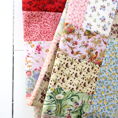 rectangle patchwork quilt with floral patterns and pastel colors made in Newfoundland